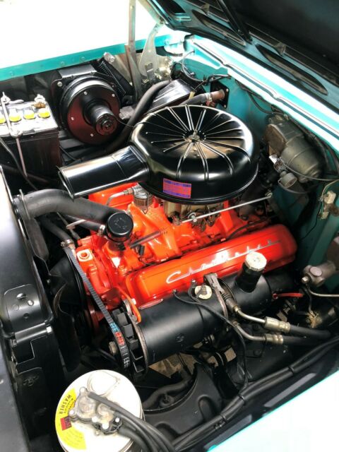 1957 Tropical Turquoise/India Ivory Chevrolet Bel Air/150/210 Coupe
