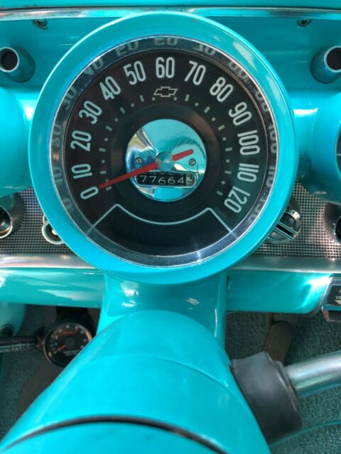 1957 Tropical Turquoise/India Ivory Chevrolet Bel Air/150/210 Coupe