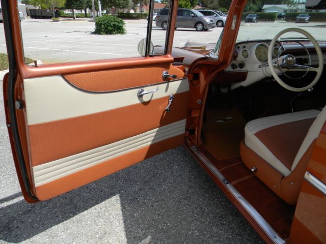 1957 Atomic orange Chevrolet Bel Air/150/210 Coupe