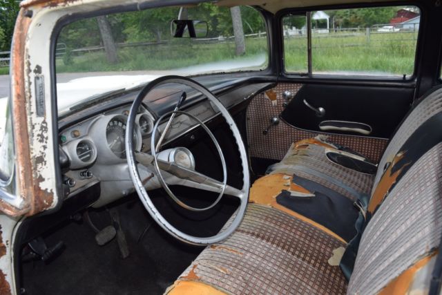 1957 White Chevrolet Bel Air/150/210 Sedan