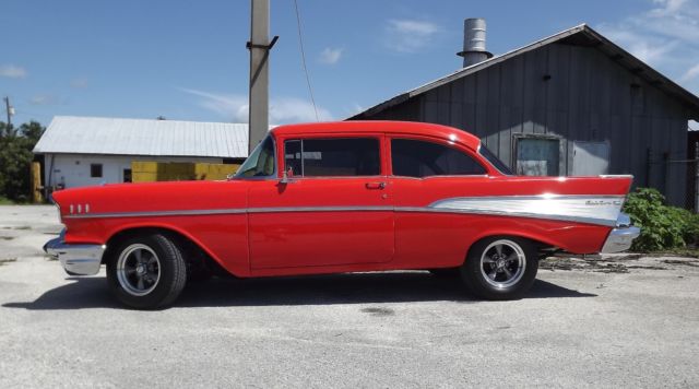 1957 Orange Chevrolet Bel Air/150/210