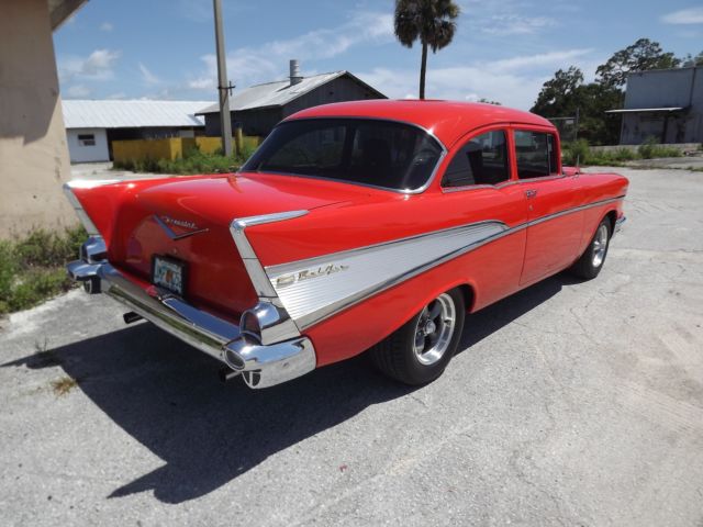 1957 Orange Chevrolet Bel Air/150/210