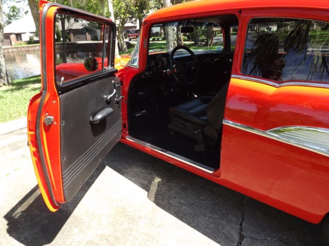 1957 Orange Chevrolet Bel Air/150/210