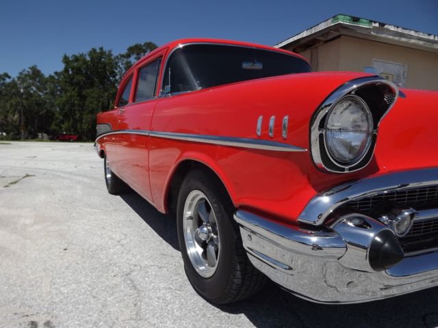 1957 Orange Chevrolet Bel Air/150/210