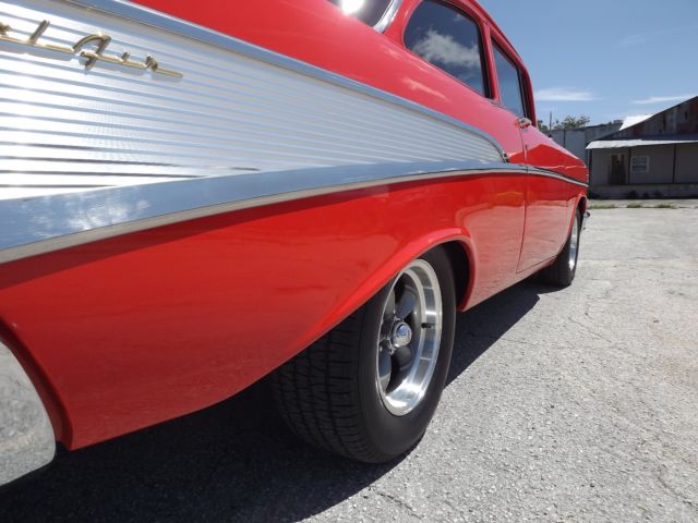 1957 Orange Chevrolet Bel Air/150/210