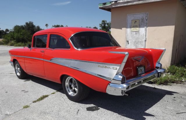 1957 Orange Chevrolet Bel Air/150/210