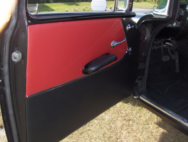 1957 Black Chevrolet Bel Air/150/210 Sedan