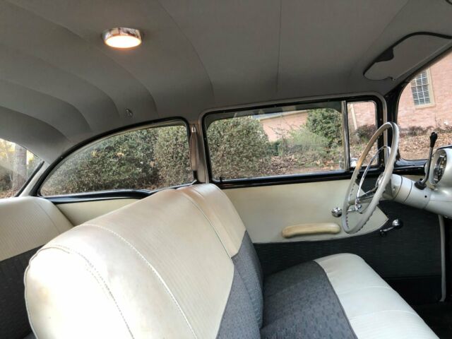 1957 Black Chevrolet Bel Air/150/210 Sedan