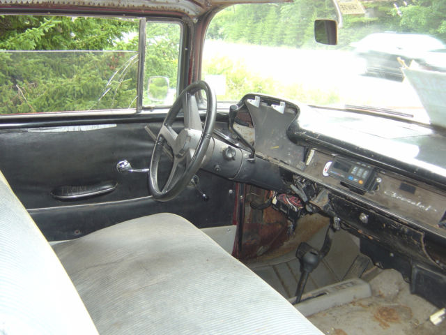 1957 Red Chevrolet Bel Air/150/210 Sedan