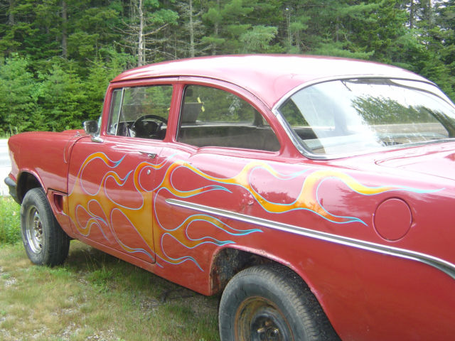 1957 Red Chevrolet Bel Air/150/210 Sedan