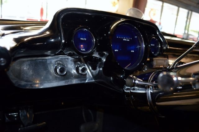 1957 Orange Chevrolet Bel Air/150/210