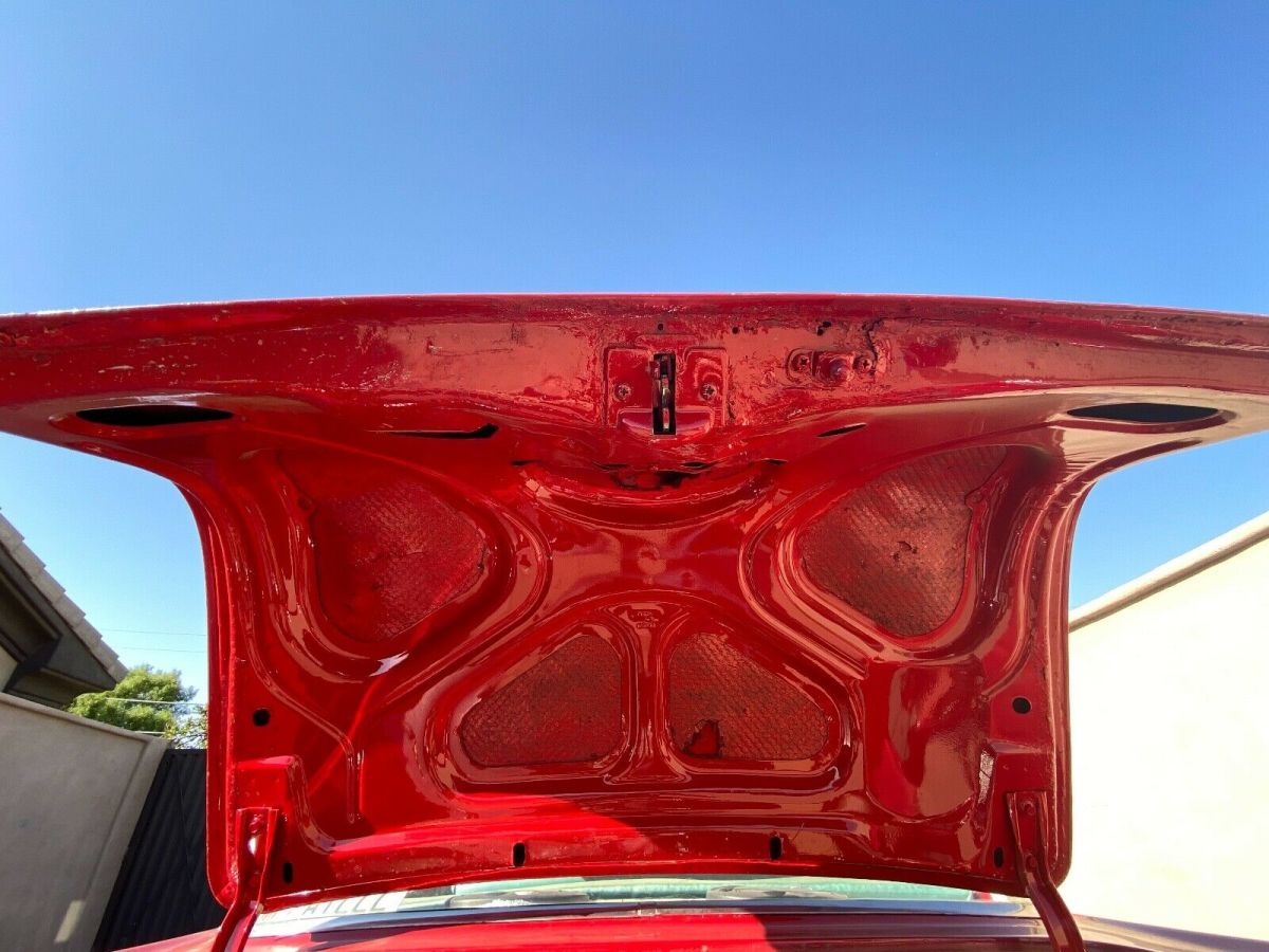1957 Red Chevrolet Bel Air/150/210 Sedan