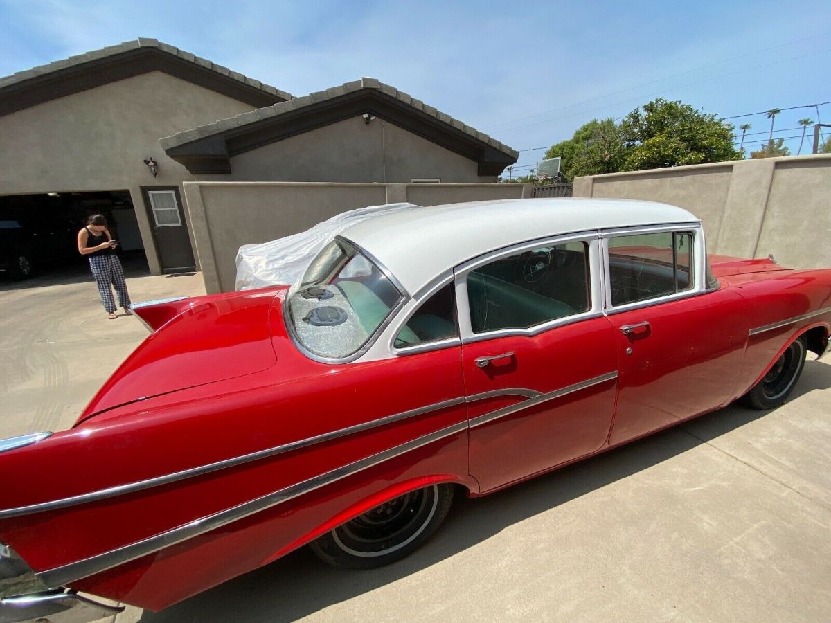 1957 Red Chevrolet Bel Air/150/210 Sedan