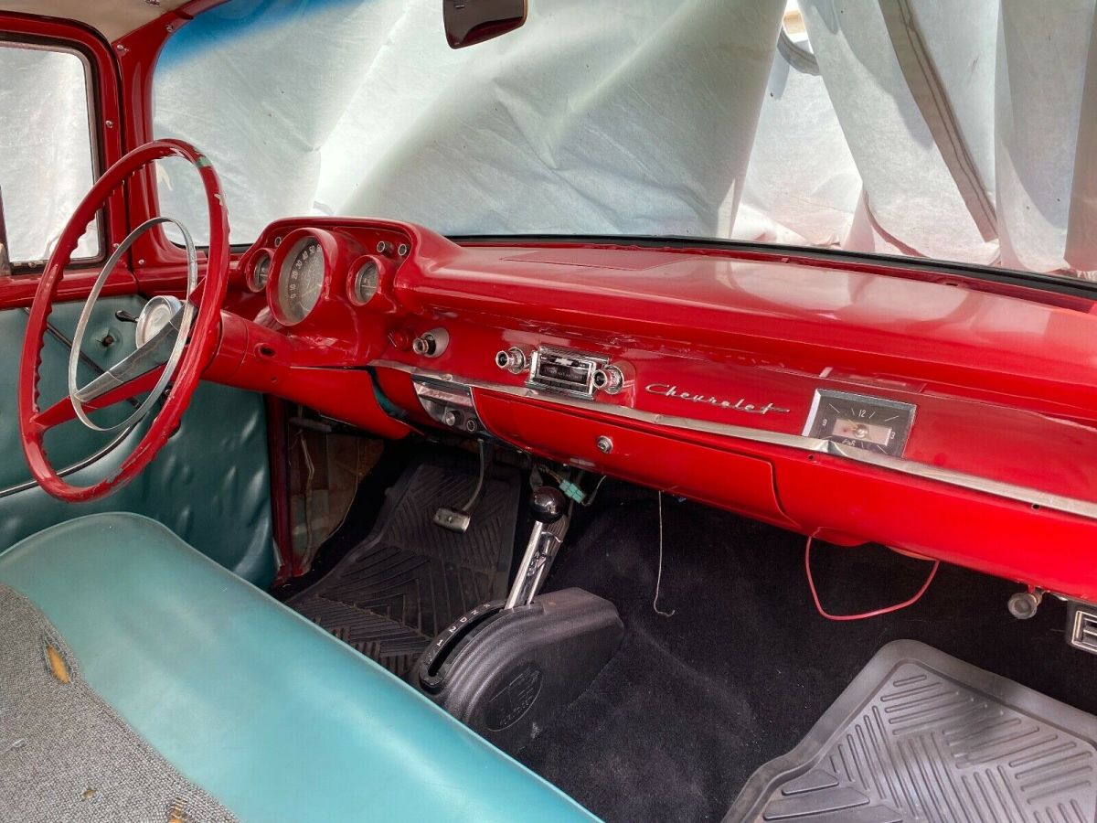 1957 Red Chevrolet Bel Air/150/210 Sedan