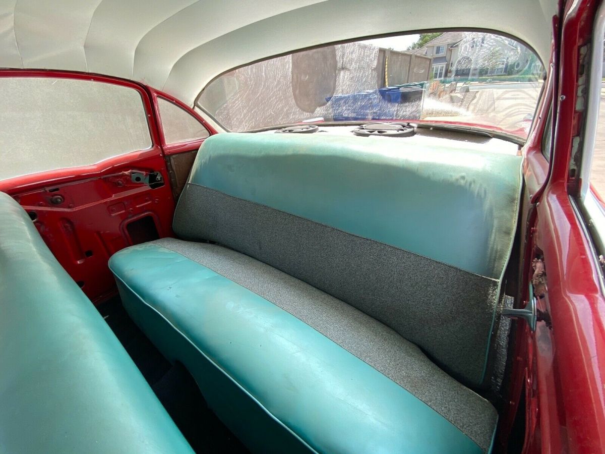 1957 Red Chevrolet Bel Air/150/210 Sedan