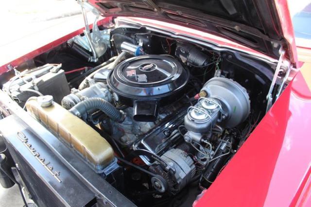 1957 Red Chevrolet Bel Air/150/210 Sedan