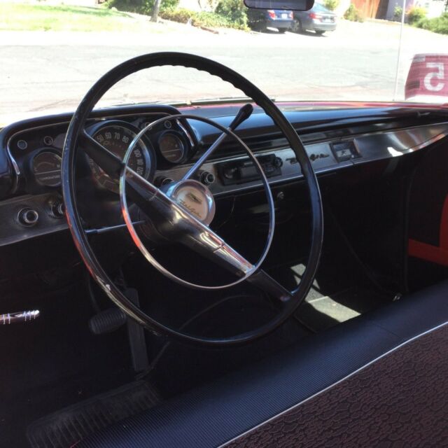 1957 Red/White Chevrolet Bel Air/150/210 Coupe