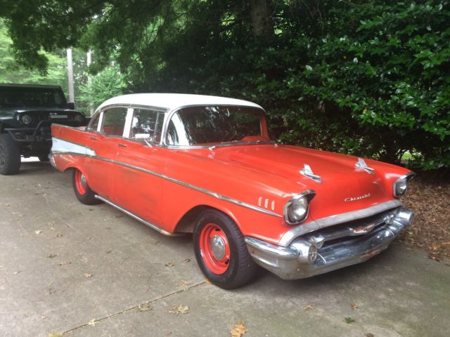 1957 Orange Chevrolet Bel Air/150/210 Sedan