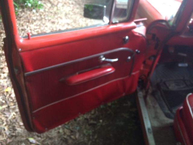 1957 Orange Chevrolet Bel Air/150/210 Sedan