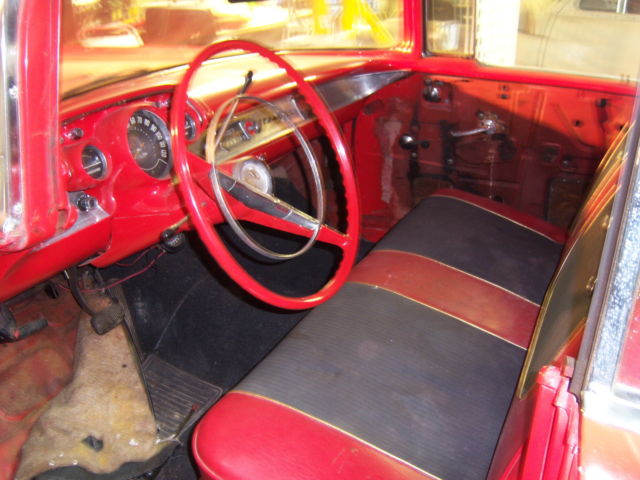 1957 Red/White Chevrolet Bel Air/150/210 4 Dr Hard Top