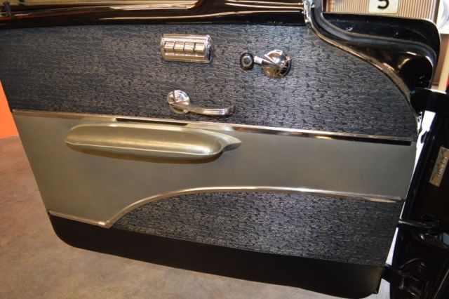 1957 Orange Chevrolet Bel Air/150/210