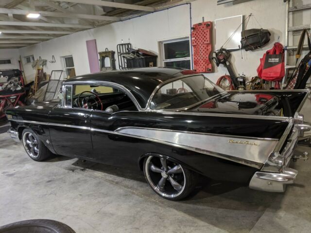 1957 black Chevrolet Bel Air/150/210