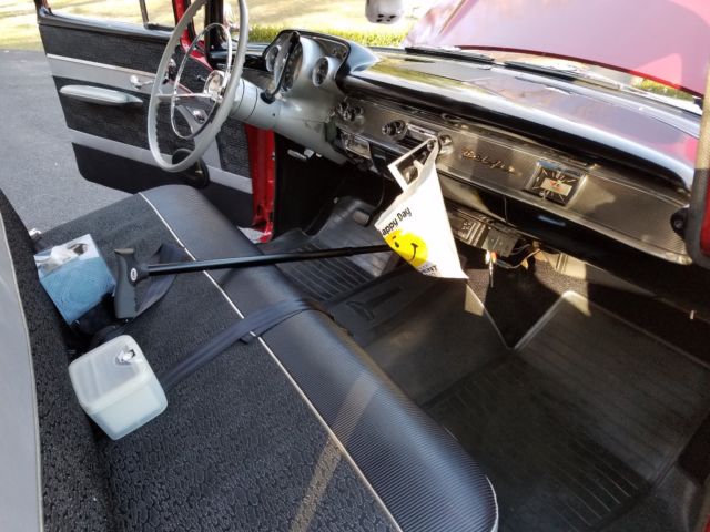 1957 Red Chevrolet Bel Air/150/210 Sedan