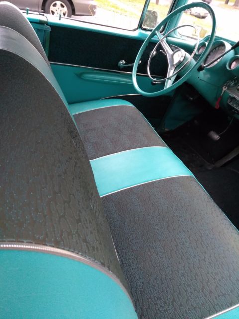 1957 turquoise-blue & white Chevrolet Bel Air/150/210 Hardtop 4dr