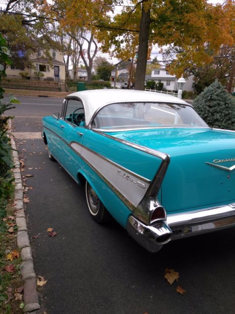 1957 turquoise-blue & white Chevrolet Bel Air/150/210 Hardtop 4dr