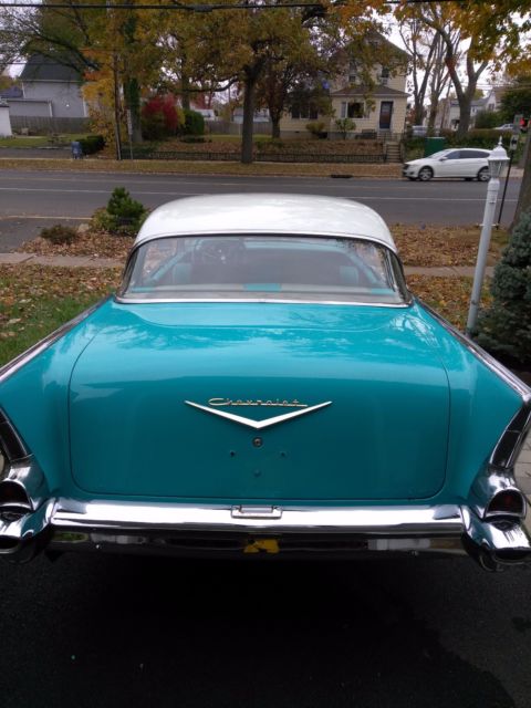1957 turquoise-blue & white Chevrolet Bel Air/150/210 Hardtop 4dr