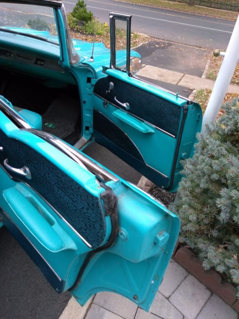1957 turquoise-blue & white Chevrolet Bel Air/150/210 Hardtop 4dr