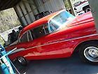 1957 Red Chevrolet Bel Air/150/210 Coupe