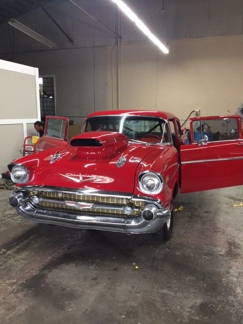 1957 Red Chevrolet Bel Air/150/210 Coupe