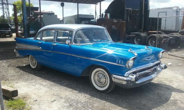 1957 Blue and silver Chevrolet Bel Air/150/210 sedan