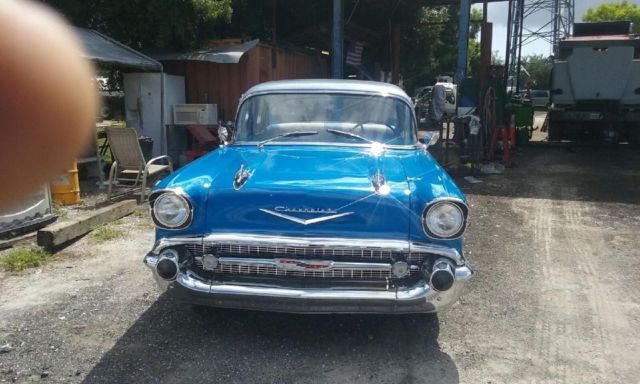 1957 Blue and silver Chevrolet Bel Air/150/210 sedan