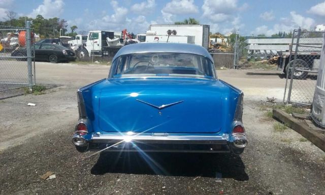 1957 Blue and silver Chevrolet Bel Air/150/210 sedan