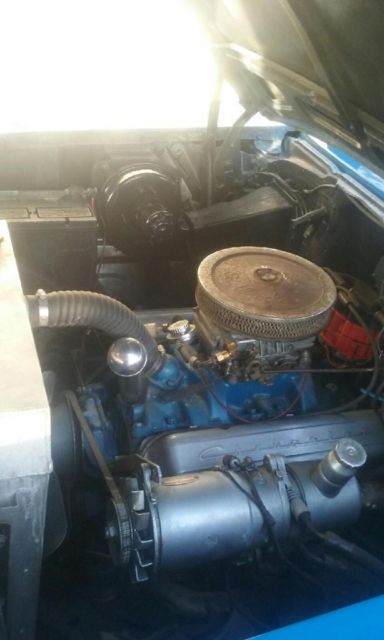 1957 Blue and silver Chevrolet Bel Air/150/210 sedan