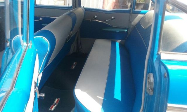 1957 Blue and silver Chevrolet Bel Air/150/210 sedan