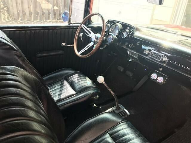 1957 Orange Chevrolet Bel Air/150/210 Sedan