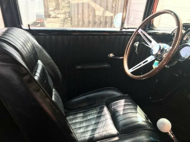 1957 Orange Chevrolet Bel Air/150/210 Sedan