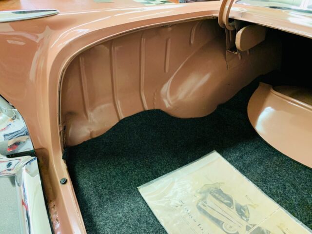 1957 Salmon Chevrolet Bel Air/150/210 Sedan