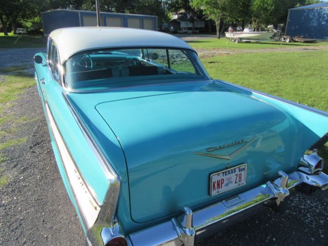 1957 turqoise and white Chevrolet Bel Air/150/210 Coupe