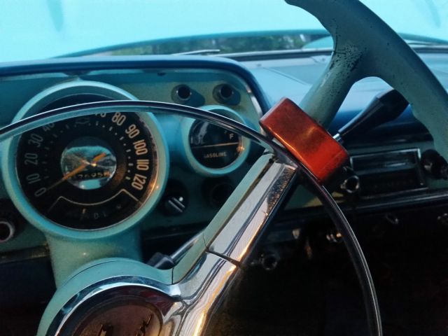 1957 Turquoise Chevrolet Bel Air/150/210 Sedan