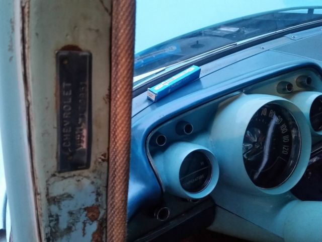 1957 Turquoise Chevrolet Bel Air/150/210 Sedan