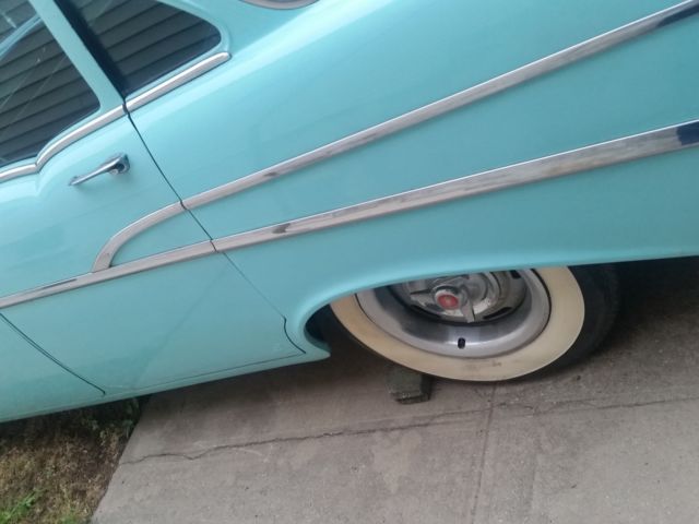 1957 Turquoise Chevrolet Bel Air/150/210 Sedan