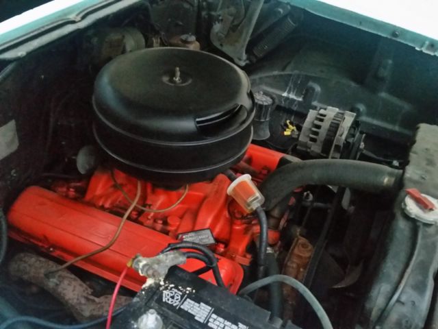 1957 Turquoise Chevrolet Bel Air/150/210 Sedan