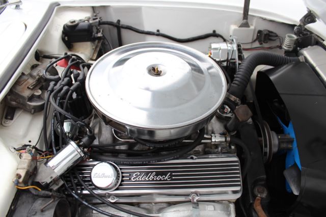 1957 Polo White w/ Silver Coves Chevrolet Corvette