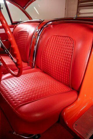 1957 Orange Chevrolet Corvette --