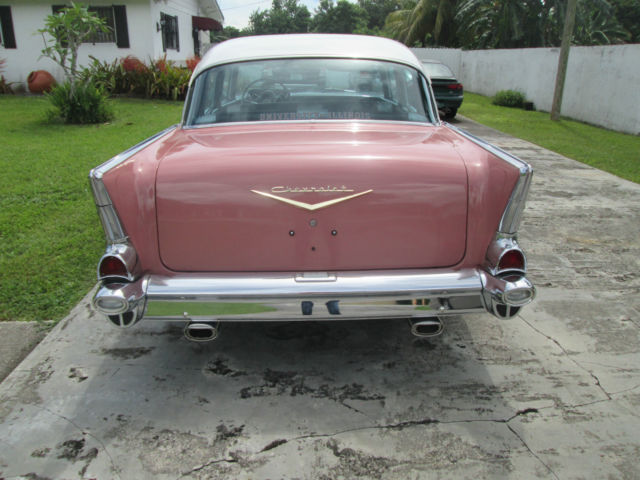 1957 Pink Chevrolet Bel Air/150/210