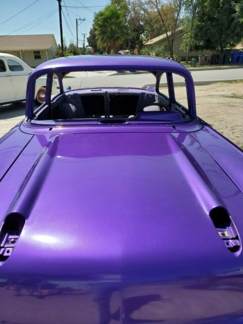 1957 Purple Chevrolet Bel Air/150/210